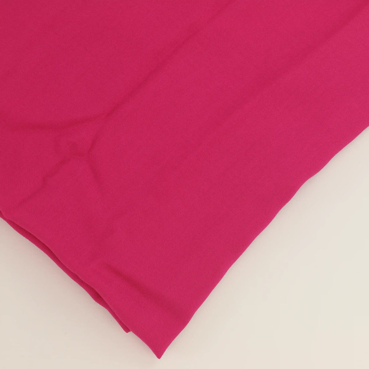 hot-pink-viscose-twill-fabric – close-up of colour, pattern and texture