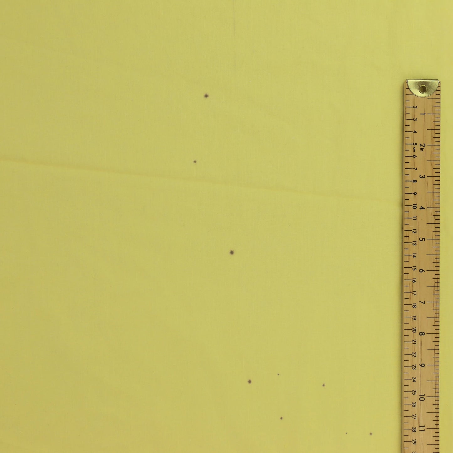 yellow-polycotton-broadcloth-fabric – close-up showing weave and surface detail