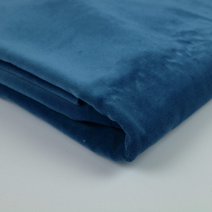 Teal viscose velvet fabric folded