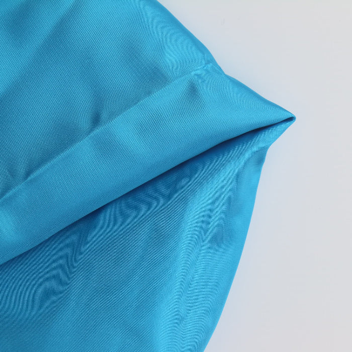 Turquoise Acetate Bengaline Fabric folded showing detail