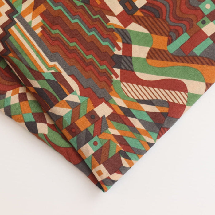 Brown graphic cotton poplin fabric folded showing detail
