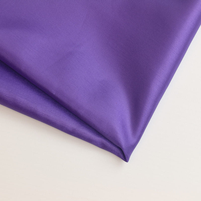Purple polyester lining fabric folded showing detail
