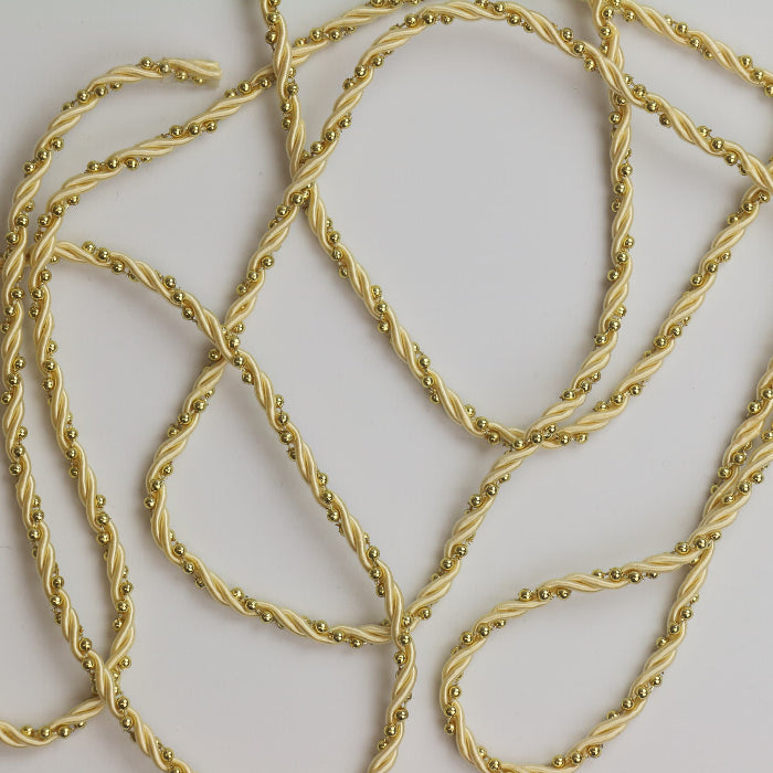 Pre-loved gold cord trim for sewing projects