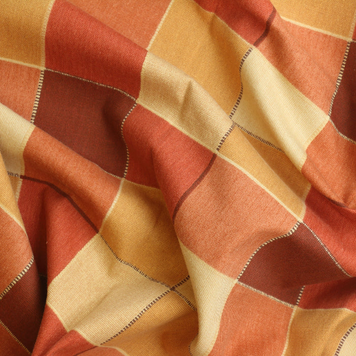 Red orange & gold checked cotton home decor fabric showing drape