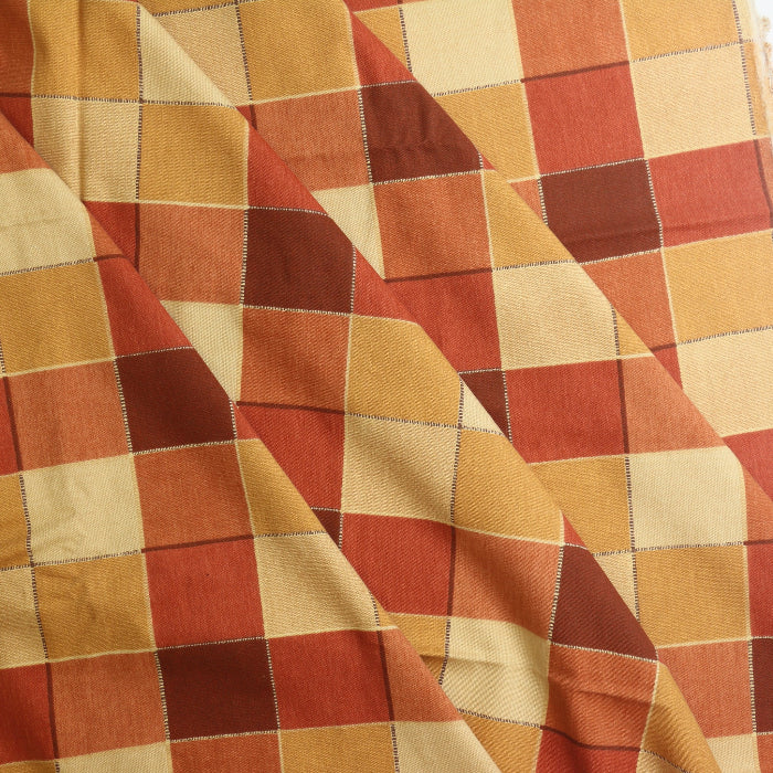 Red orange & gold checked cotton home decor fabric folded
