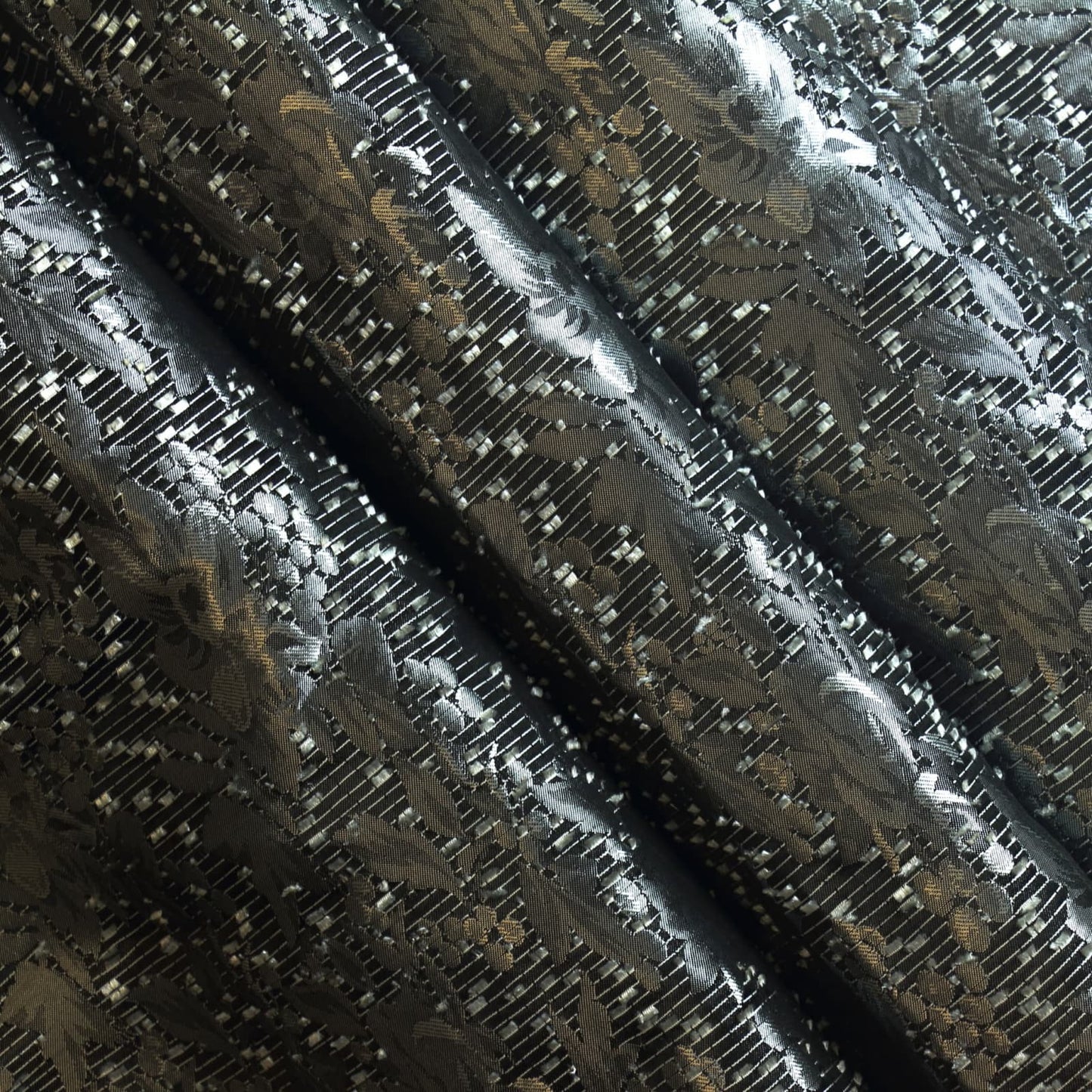 Silver & Black Jacquard fabric gently folded