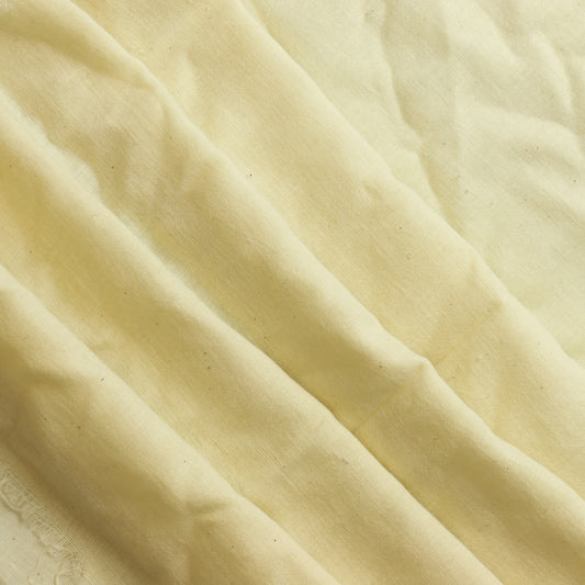 Cream butter muslin sewing fabric gently folded