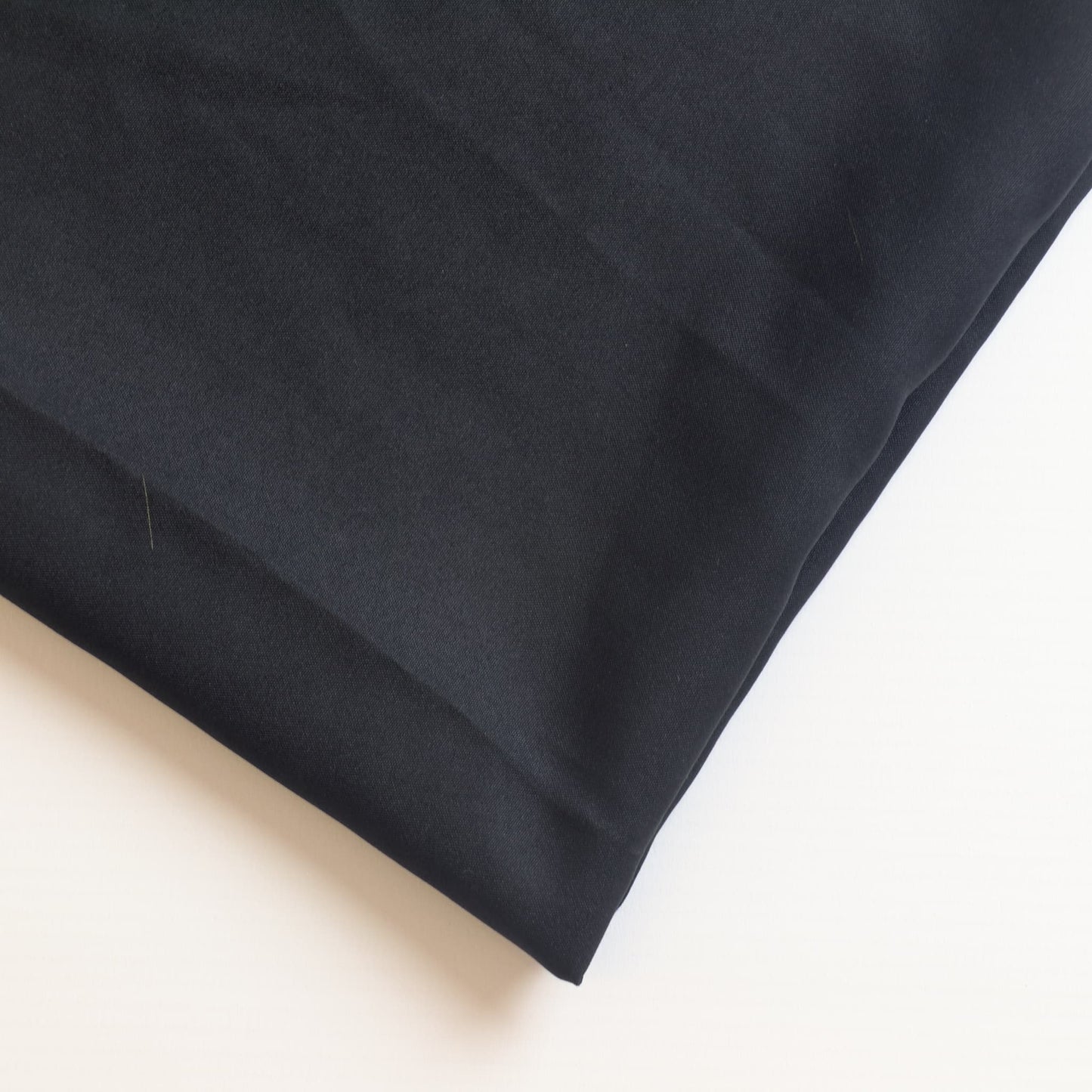 Black polyester sewing fabric close up