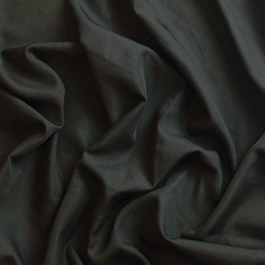 Black polyester sewing fabric showing drape
