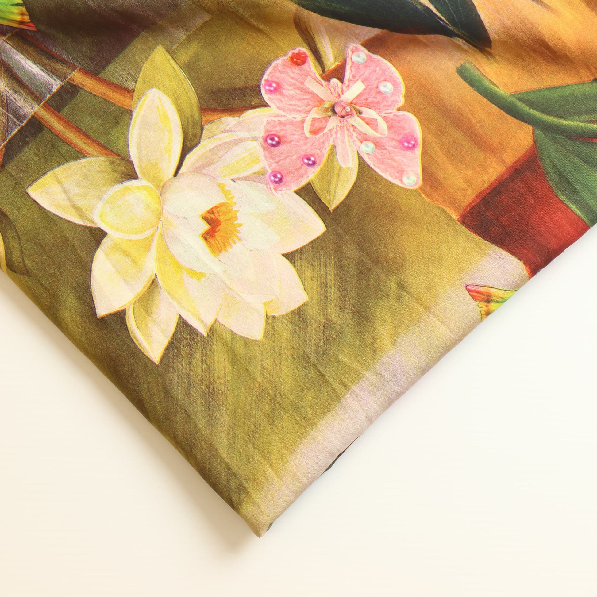 Silver grey floral crepe de chine dressmaking fabric laid flat