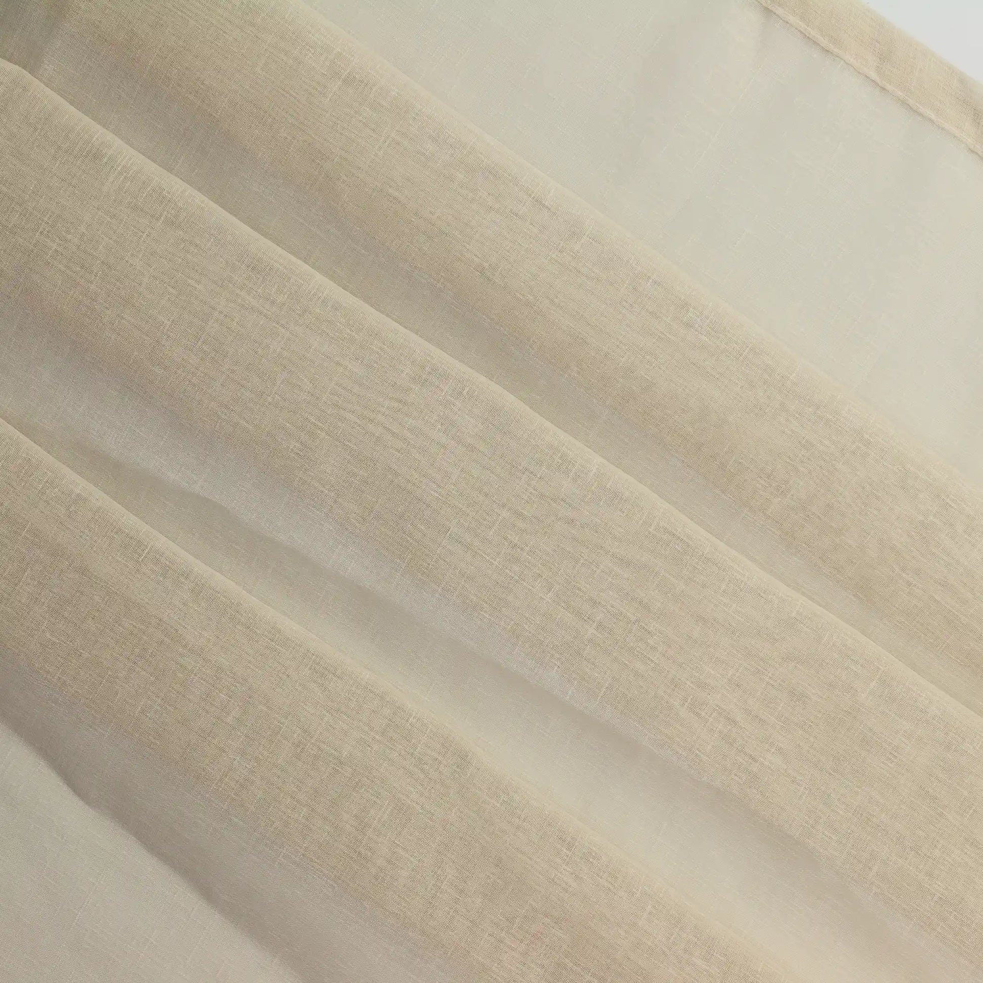 beige-net-curtain---home-decor-fabric – product laid flat showing its colour and pattern