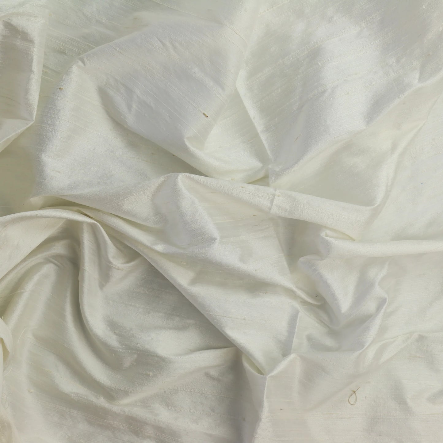 off-white-silk-dupioni-home-decor-fabric-remnants – product laid flat showing its colour and pattern