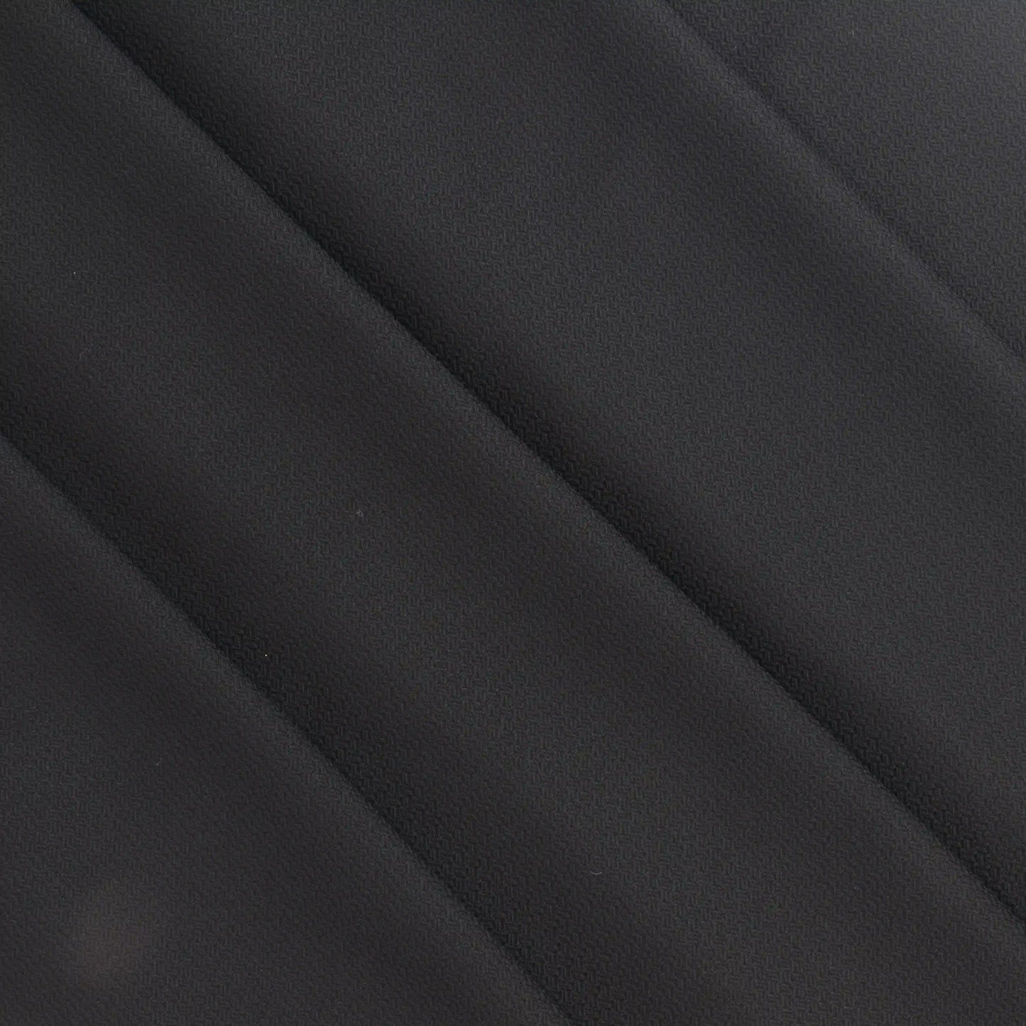 black-basket-weave-textured-polyester-suiting-fabric – product laid flat showing its colour and pattern