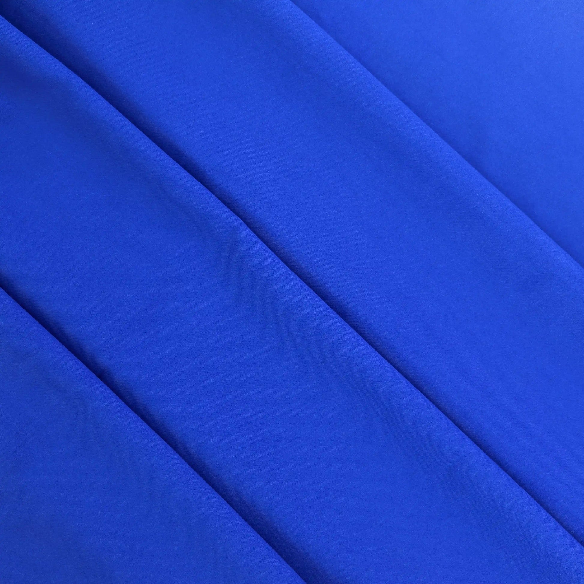 royal-blue-polyester-suiting-fabric – product laid flat showing its colour and pattern