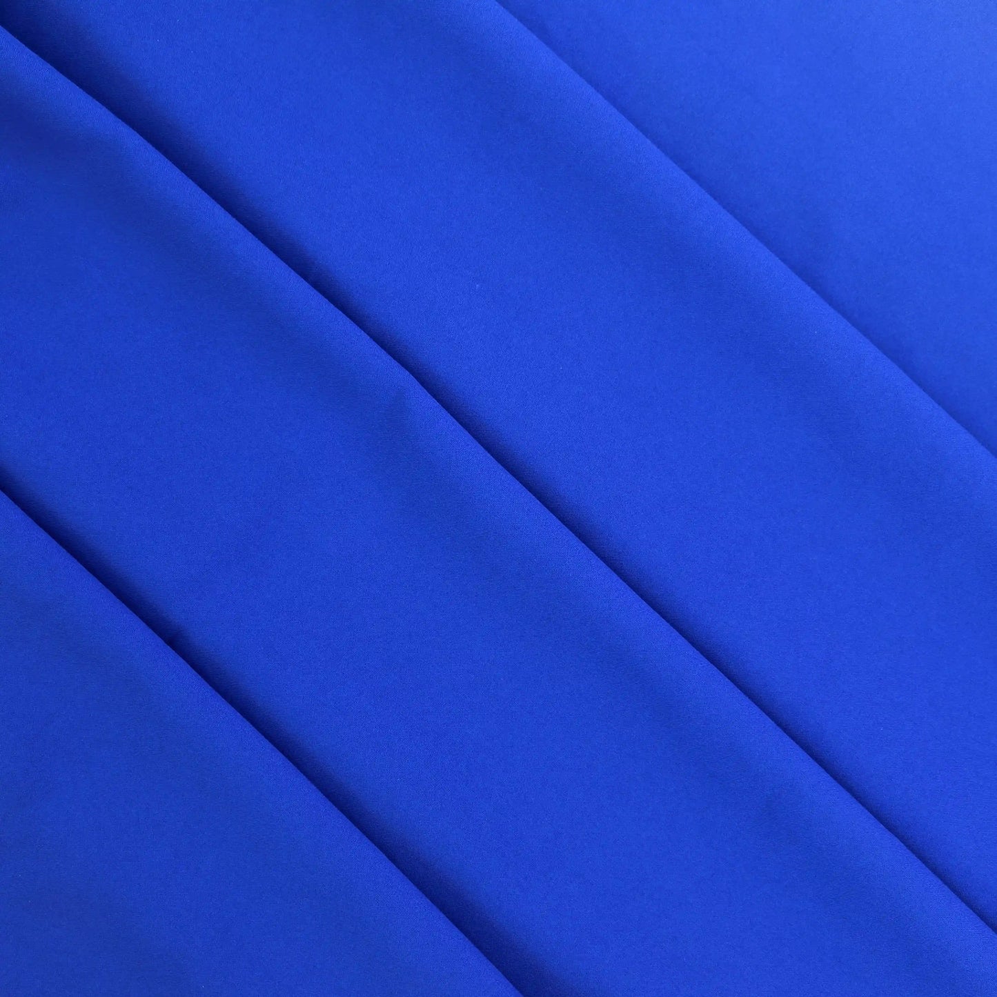 royal-blue-polyester-suiting-fabric – product laid flat showing its colour and pattern