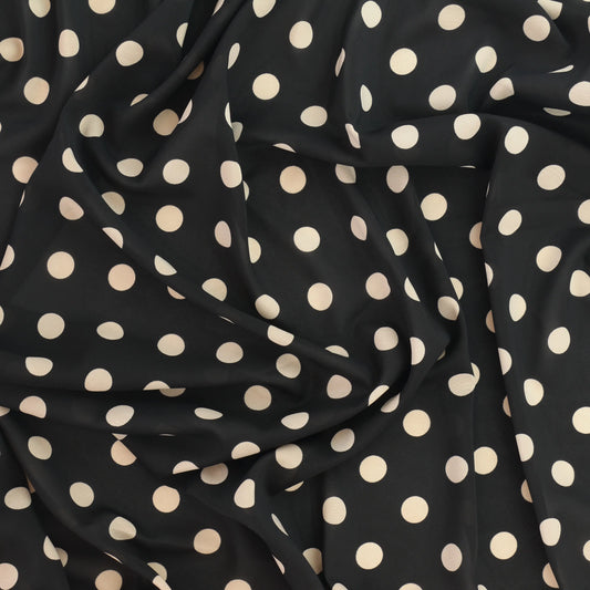 black-&-cream-polka-dot-chiffon-fabric – close-up showing weave and surface detail