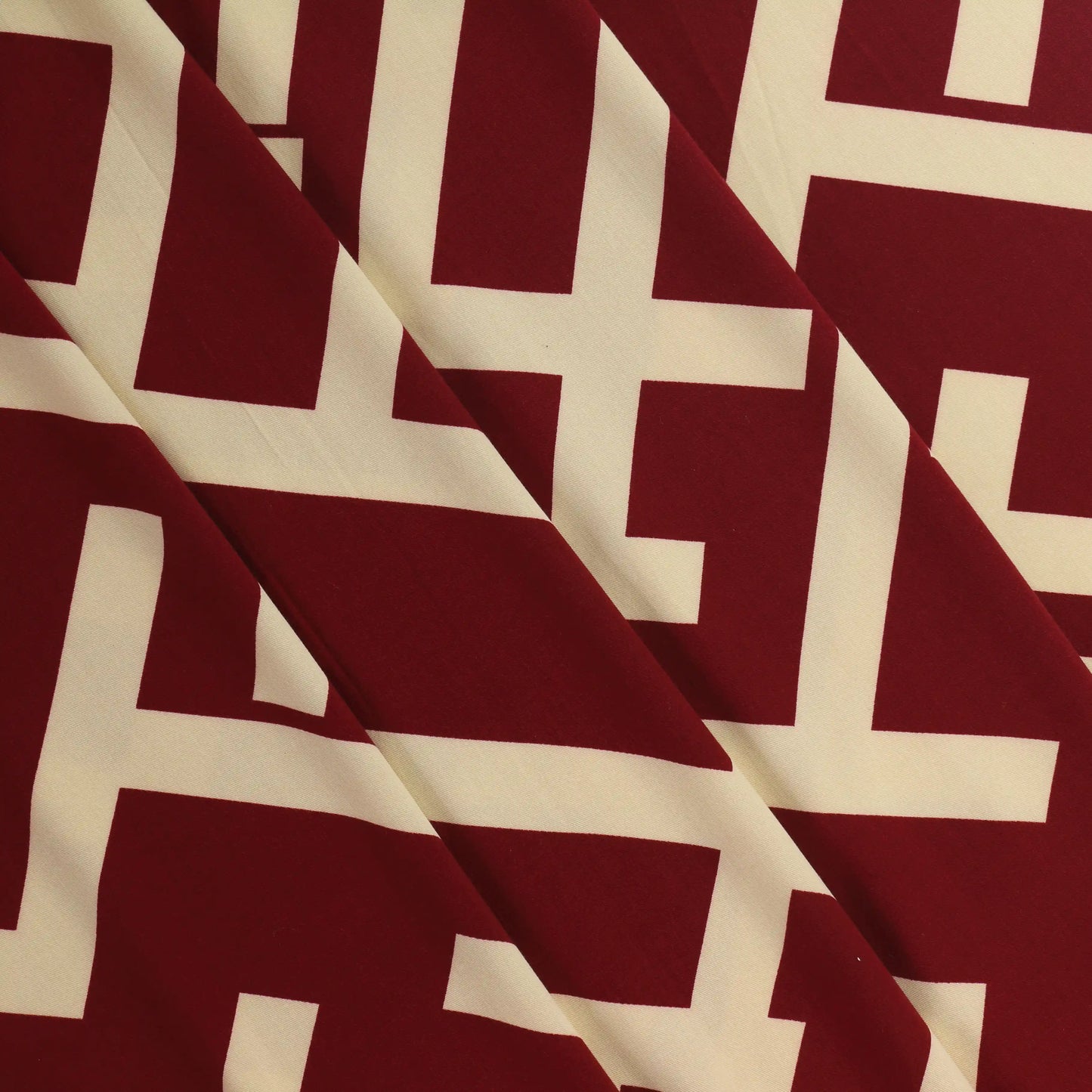 burgundy-&-cream-viscose-twill-fabric – close-up of colour, pattern and texture