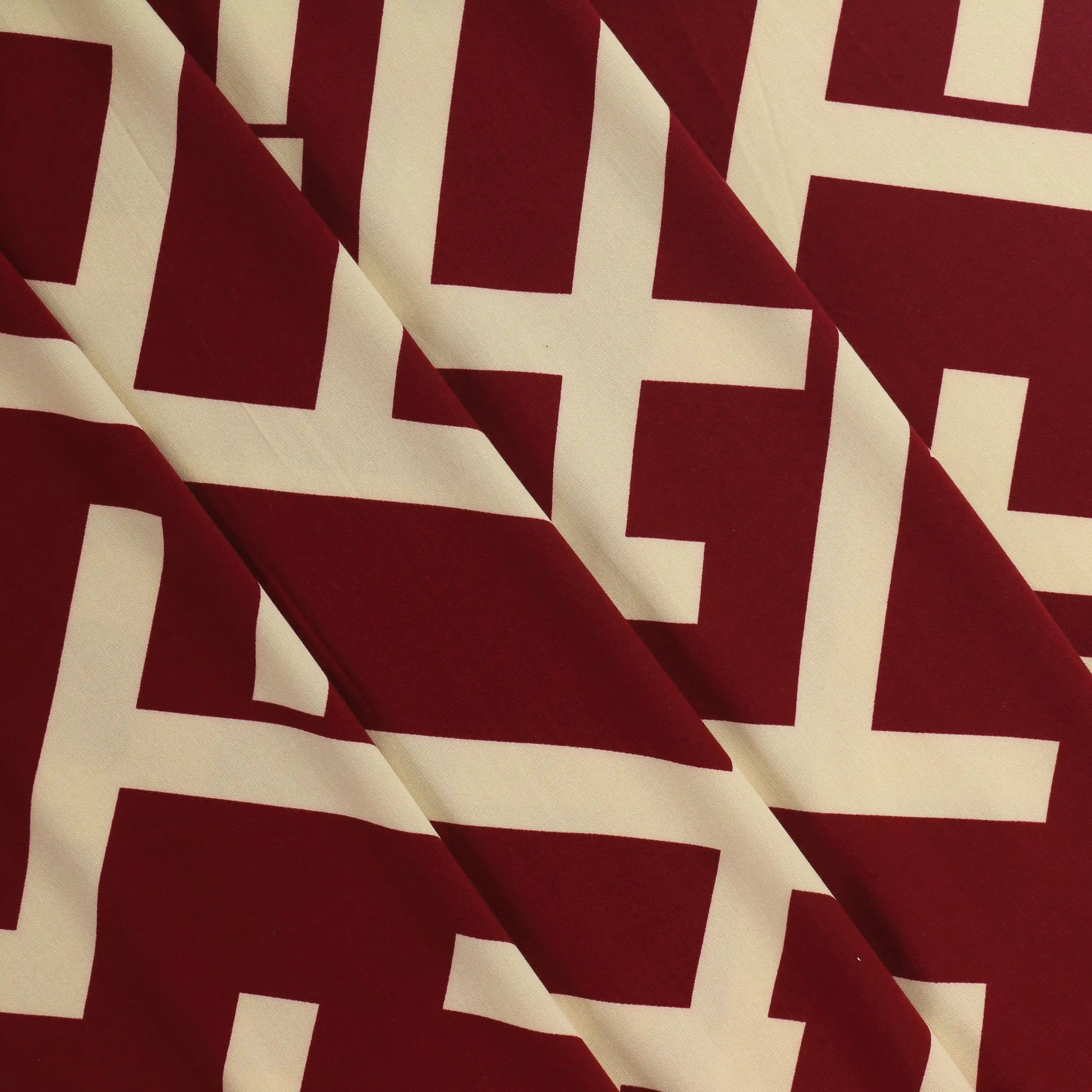 burgundy-&-cream-viscose-twill-fabric – close-up of colour, pattern and texture