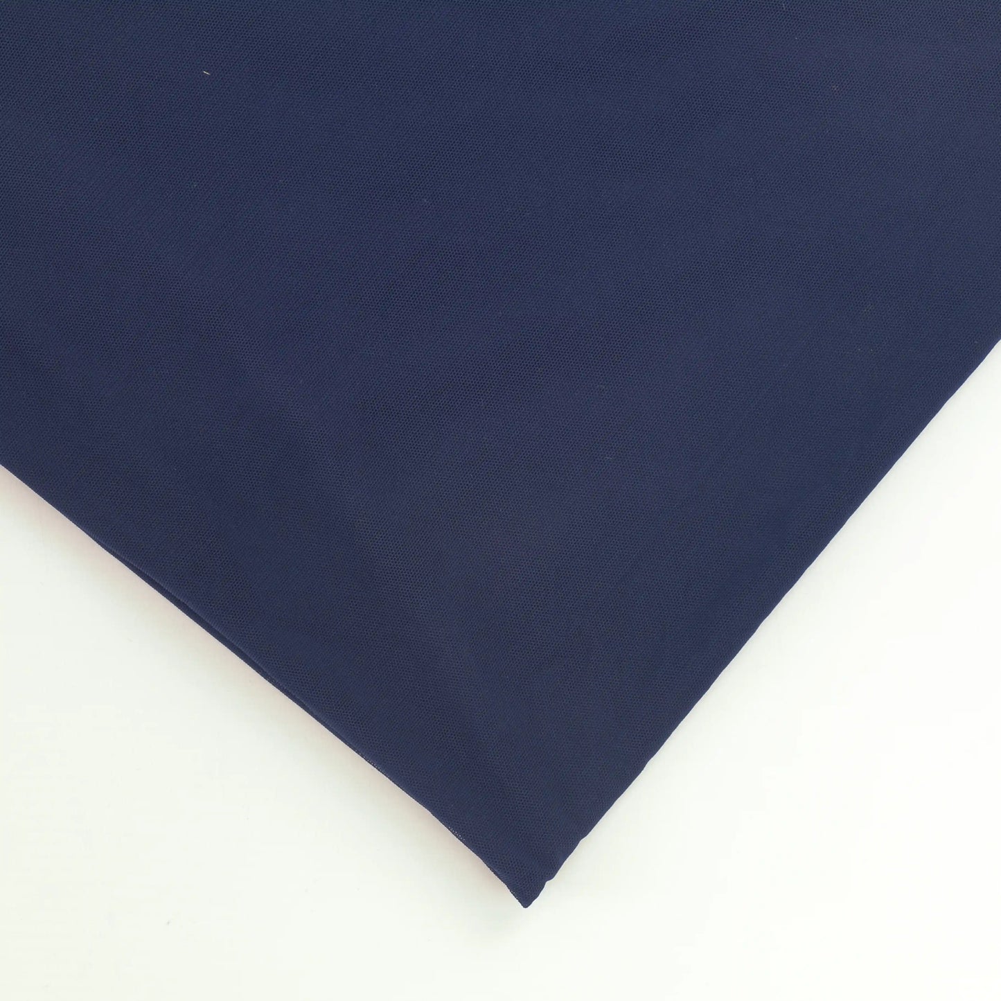 navy-sheer-stretch-mesh-fabric – close-up of colour, pattern and texture