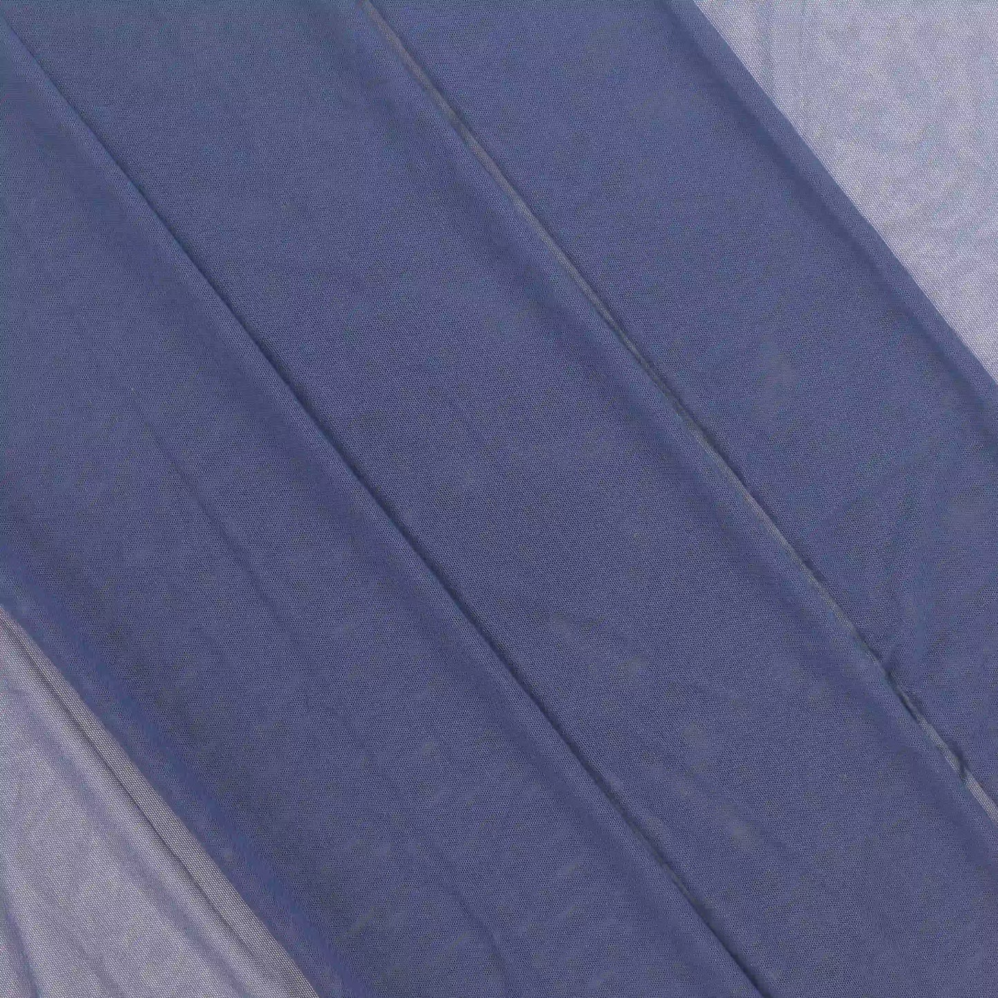 navy-sheer-stretch-mesh-fabric – product laid flat showing its colour and pattern