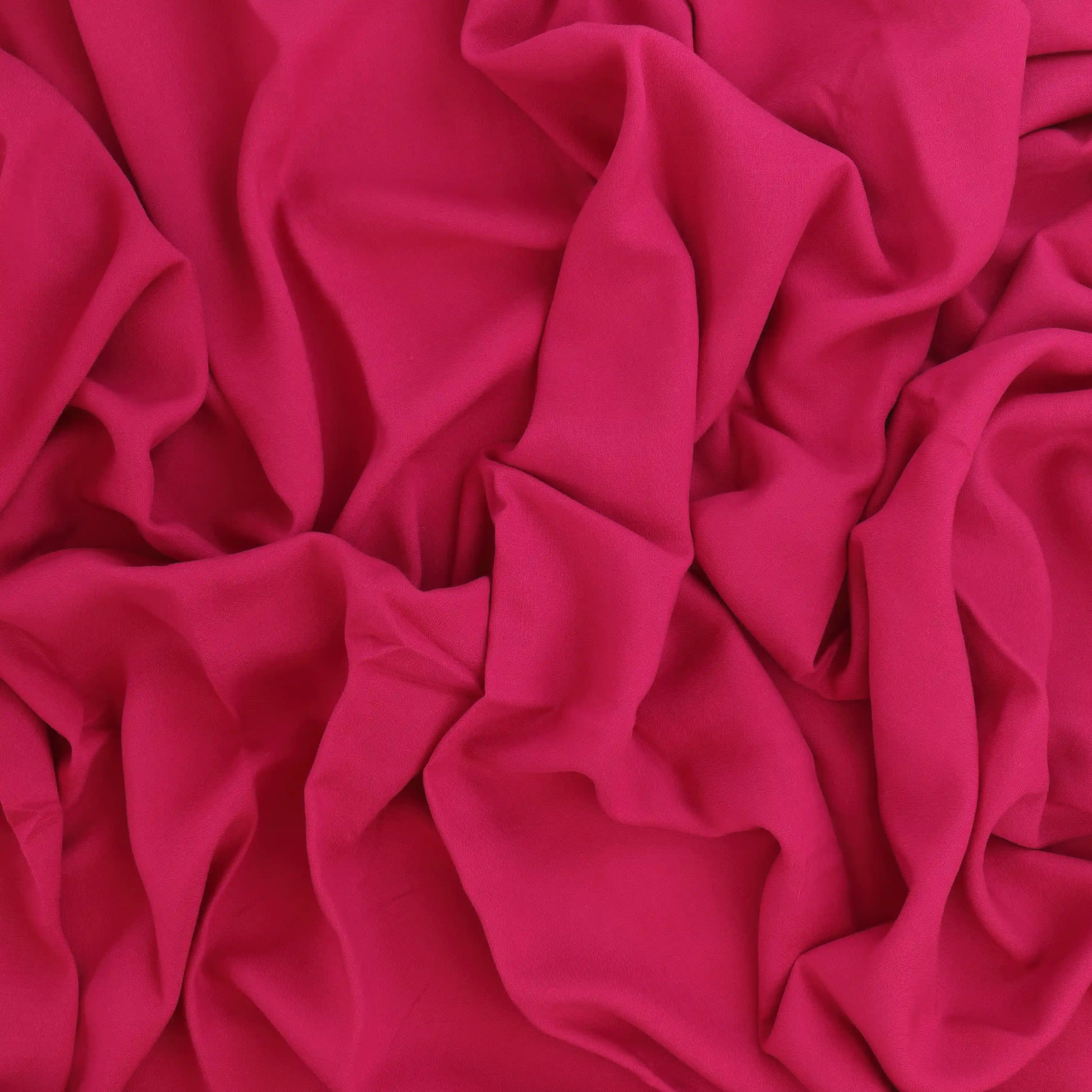 hot-pink-viscose-twill-fabric – product laid flat showing its colour and pattern