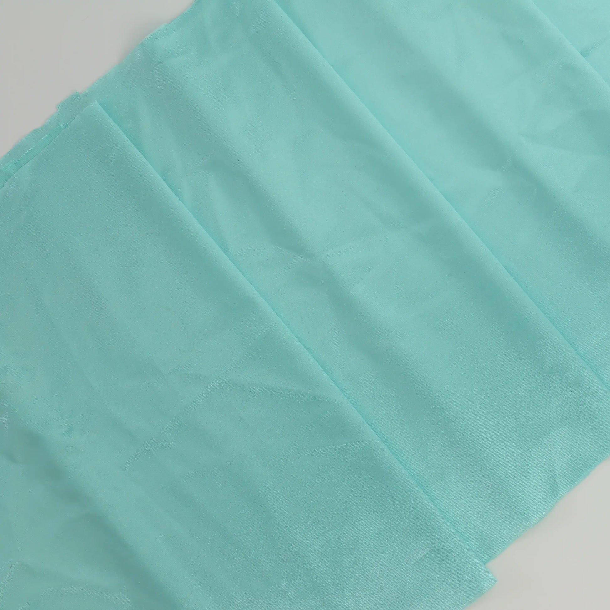 turquoise-duoplex-bra-lining-fabric – close-up of colour, pattern and texture