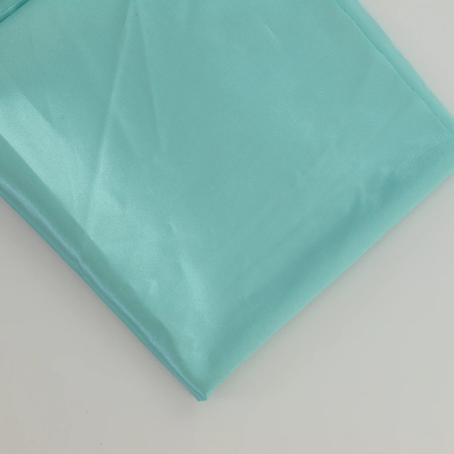 turquoise-duoplex-bra-lining-fabric – product laid flat showing its colour and pattern