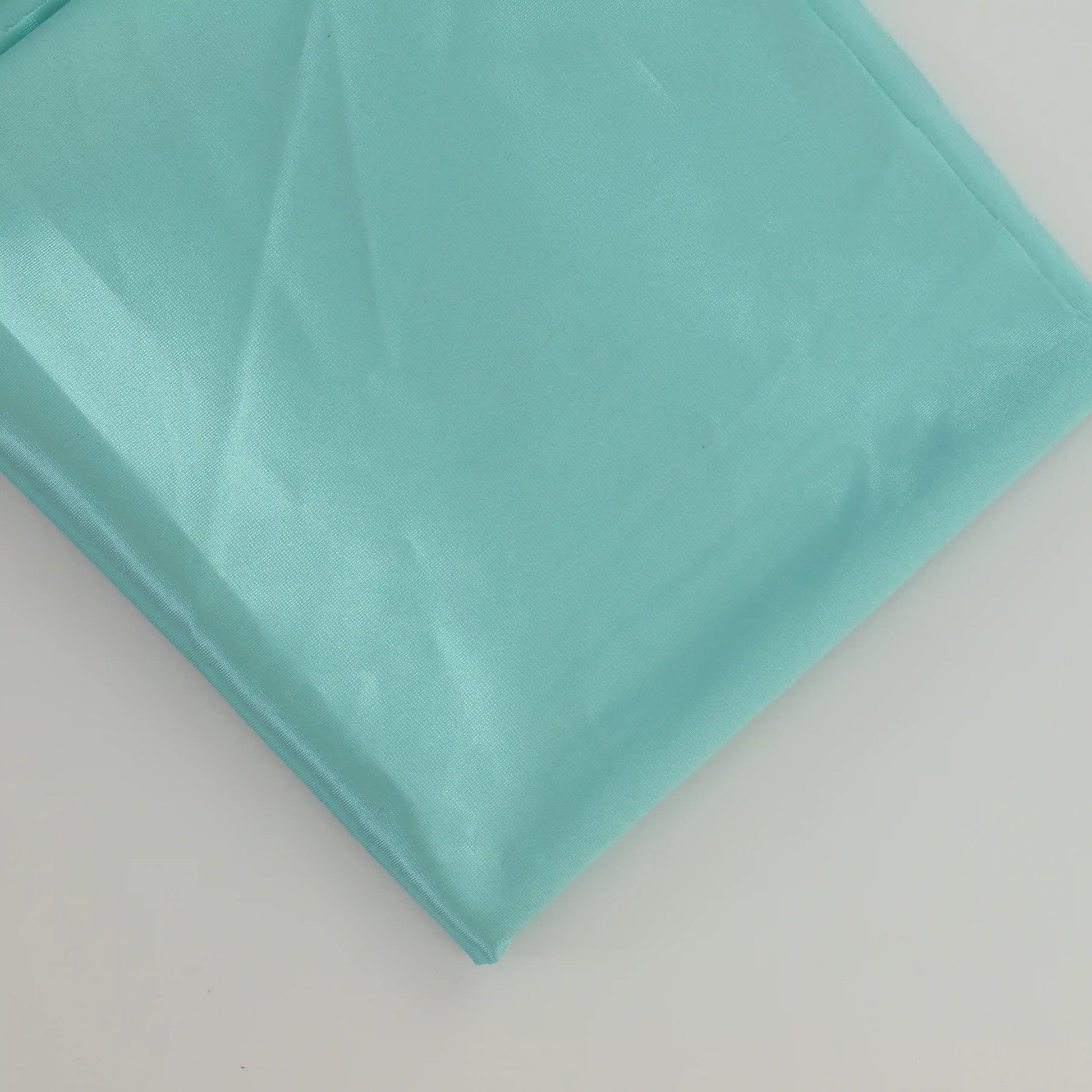 turquoise-duoplex-bra-lining-fabric – product laid flat showing its colour and pattern