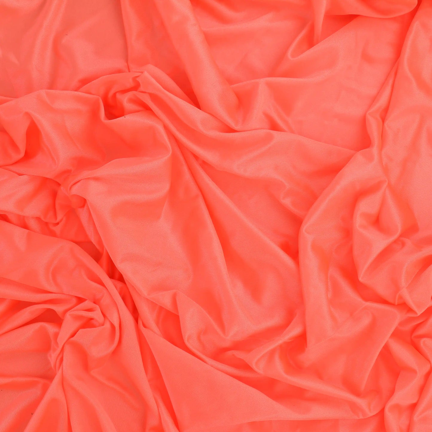 fluoro-peach-duoplex-bra-lining-fabric – product laid flat showing its colour and pattern