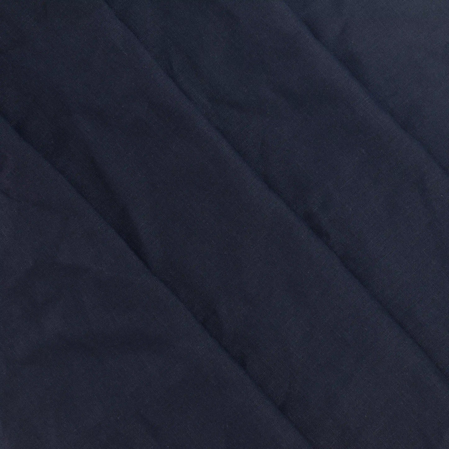 dark-navy-medium-weight-linen-fabric – product laid flat showing its colour and pattern