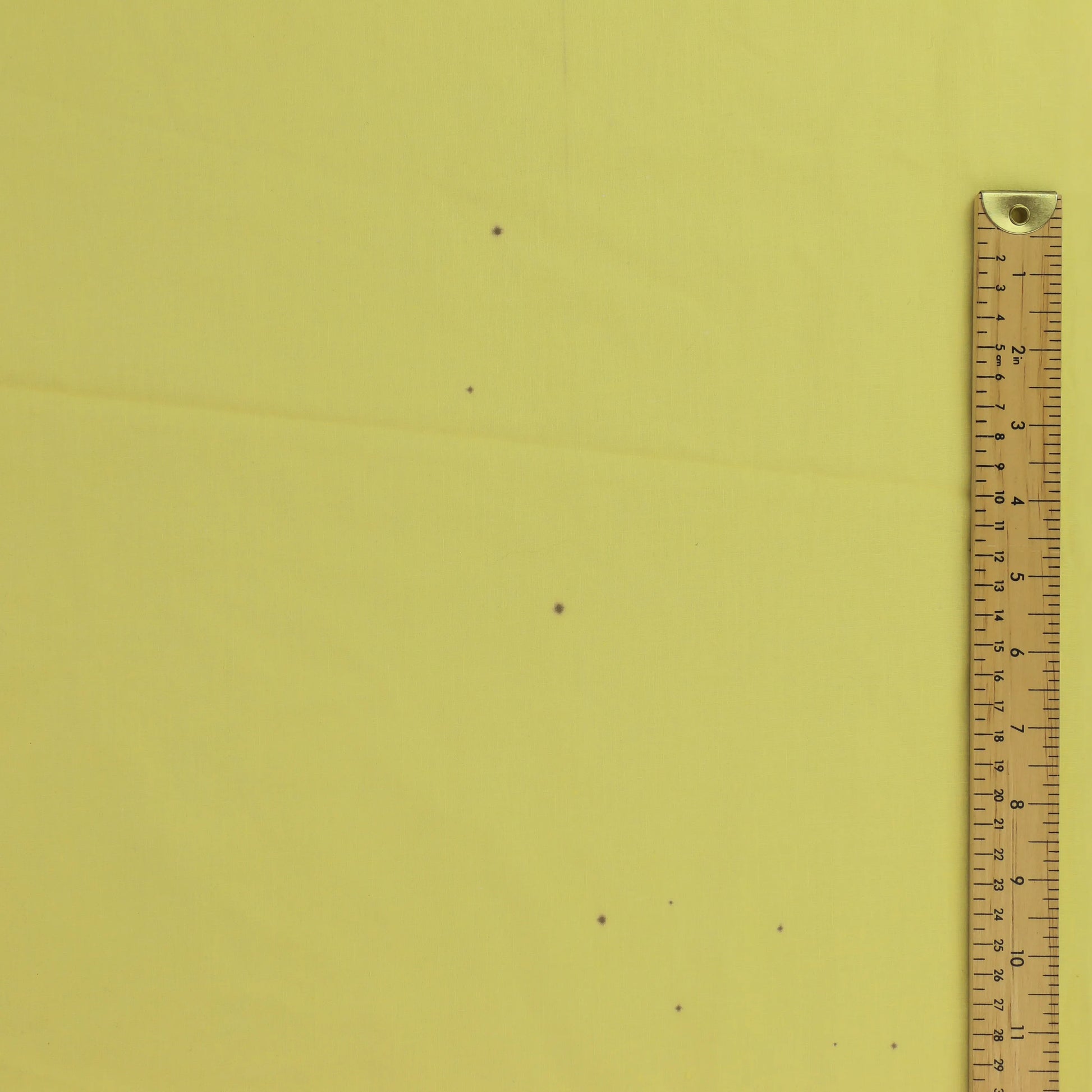 yellow-polycotton-broadcloth-fabric – close-up showing weave and surface detail