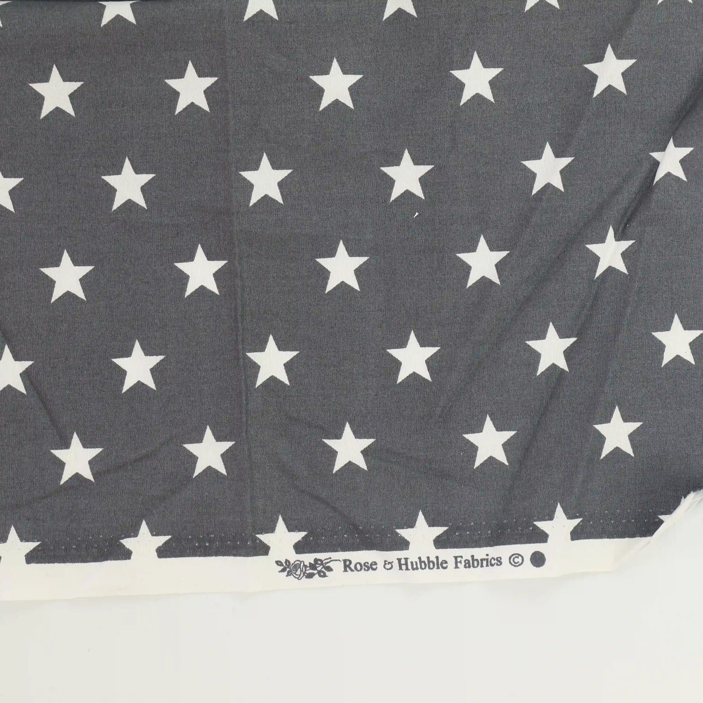 gray-&-white-star-print-cotton – close-up of colour, pattern and texture