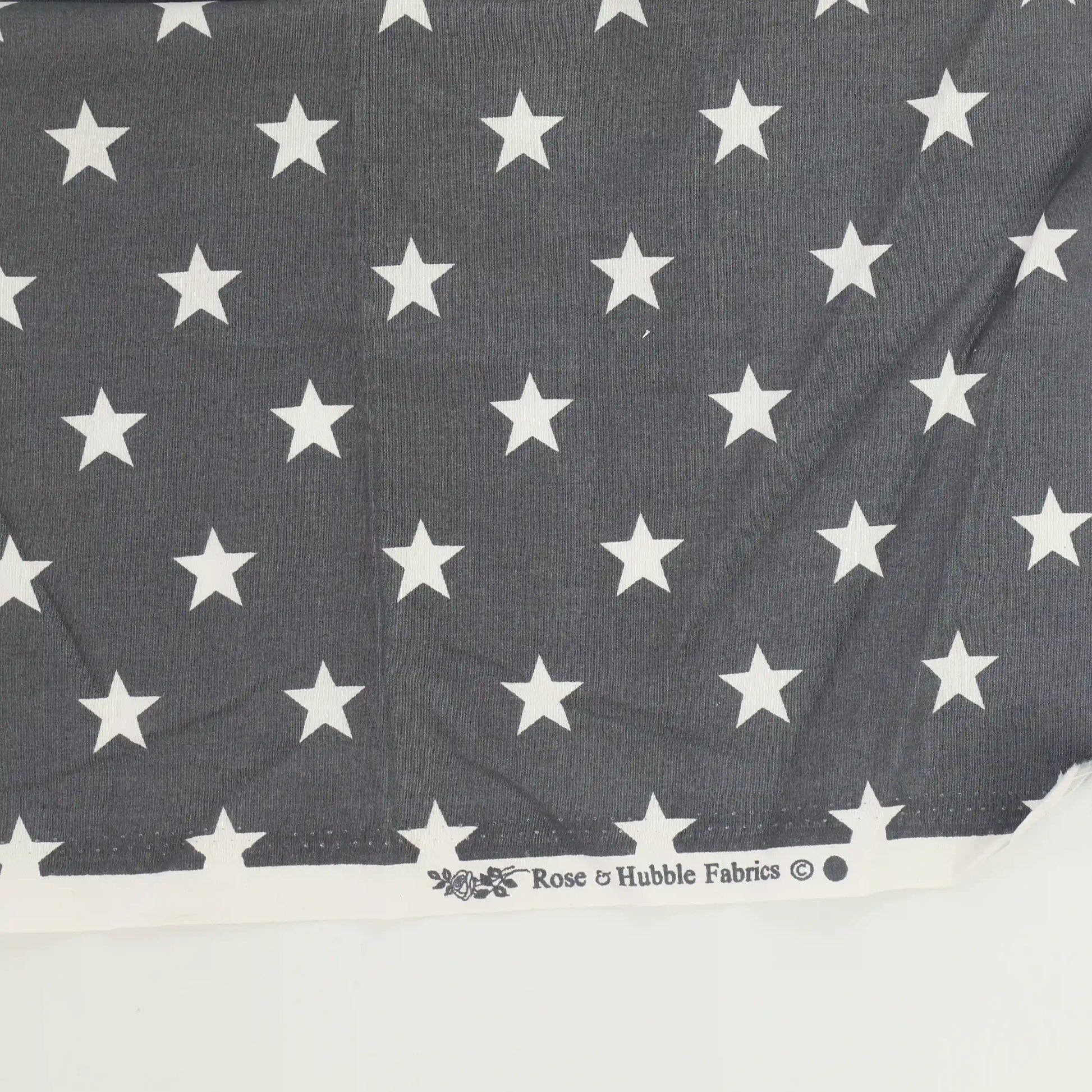 gray-&-white-star-print-cotton – close-up of colour, pattern and texture