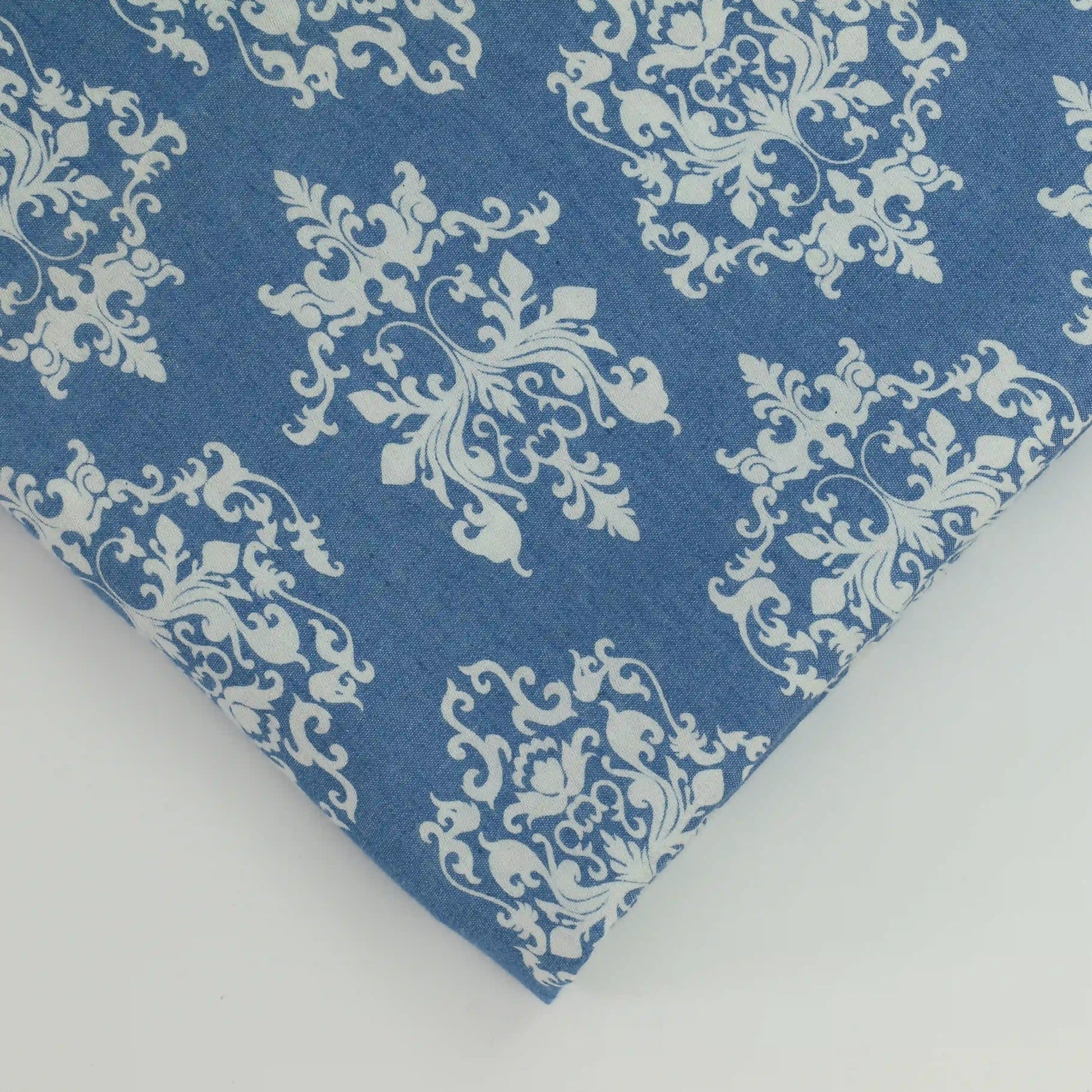 blue-&-white-damask-pattern-chambray-fabric – close-up of colour, pattern and texture