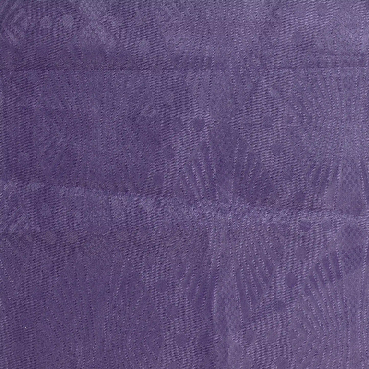 purple-patterned-polyester-fabric – close-up showing weave and surface detail