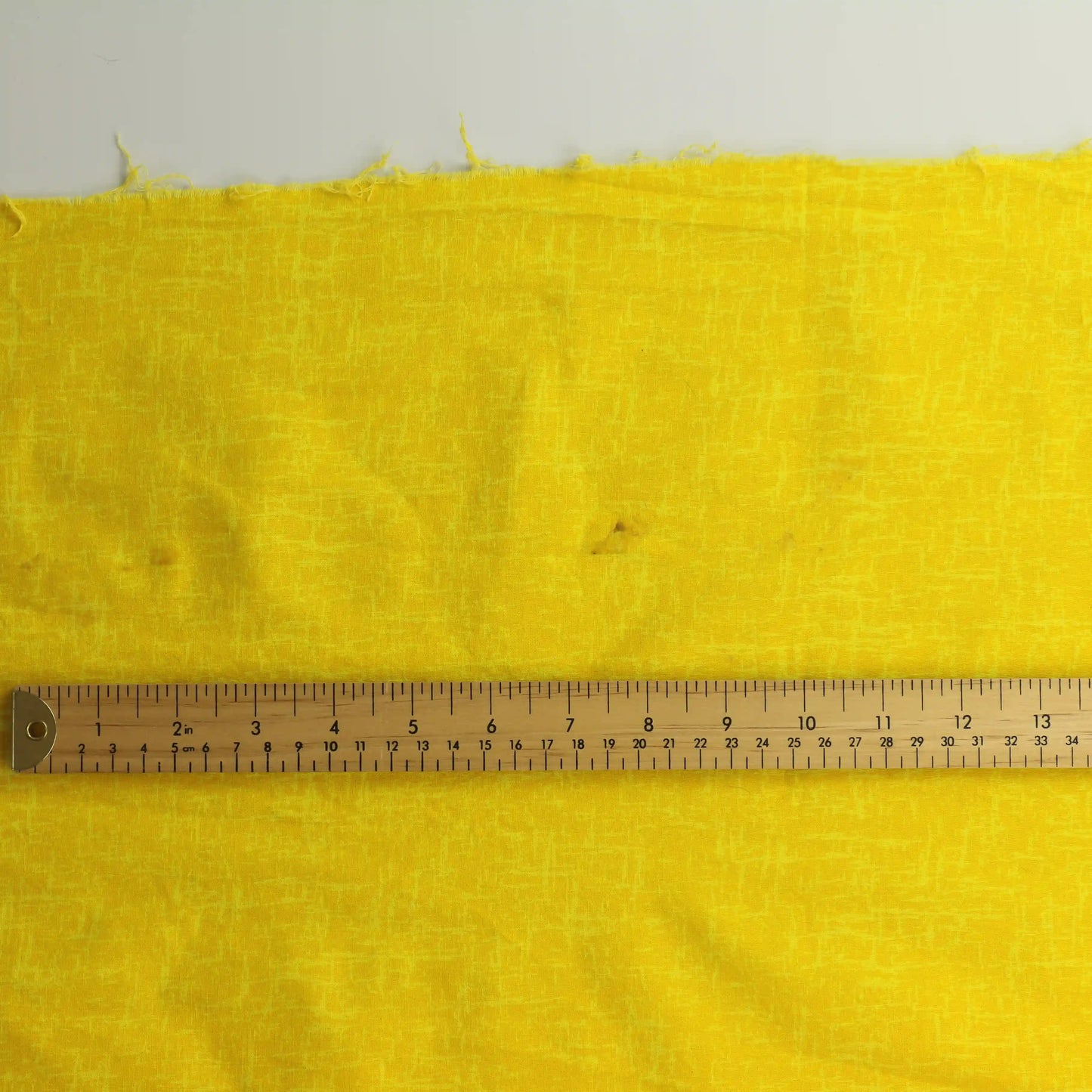 yellow-semi-solid-quilting-fabric – close-up of colour, pattern and texture