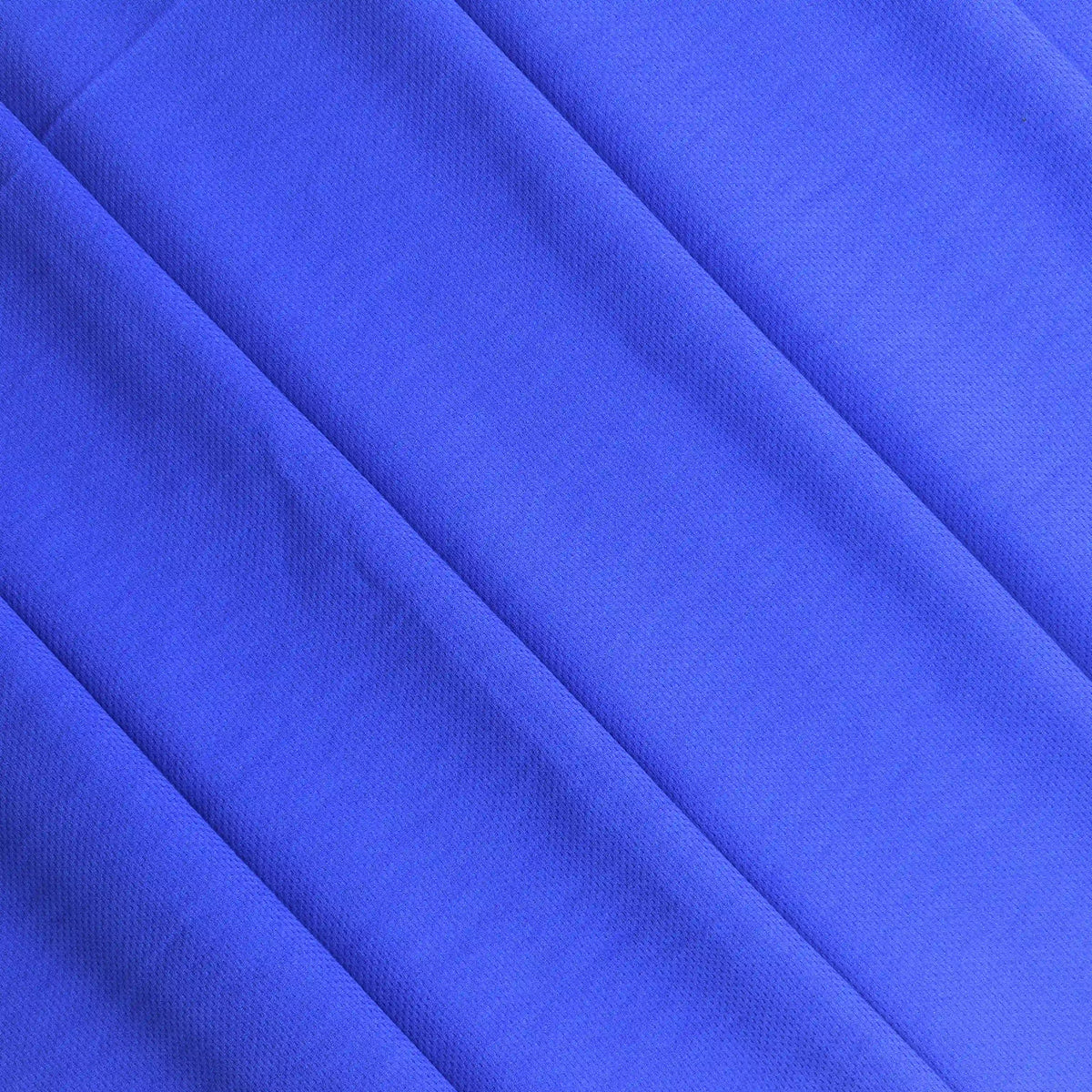 royal-blue--polyester-jersey-fabric-remnant – product gently folded showing its colour and pattern