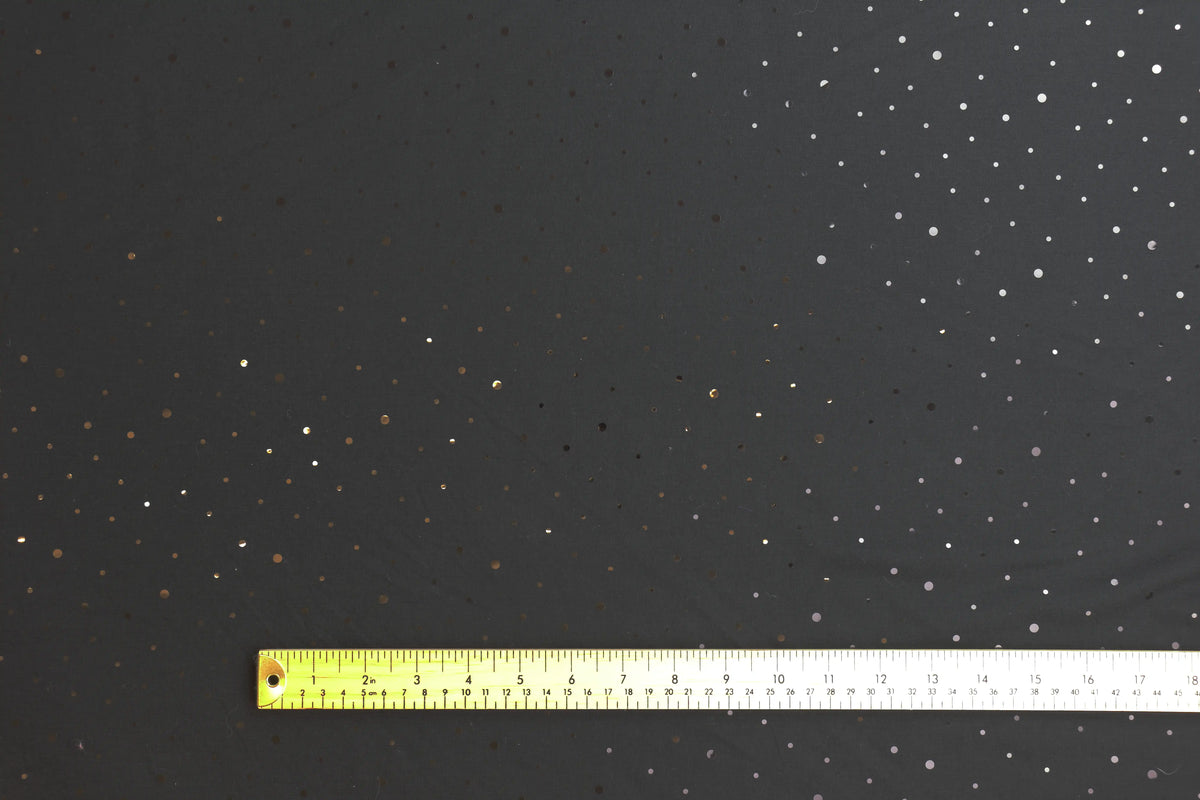 black-sequin-spot-cotton-jersey – close-up showing weave and surface detail