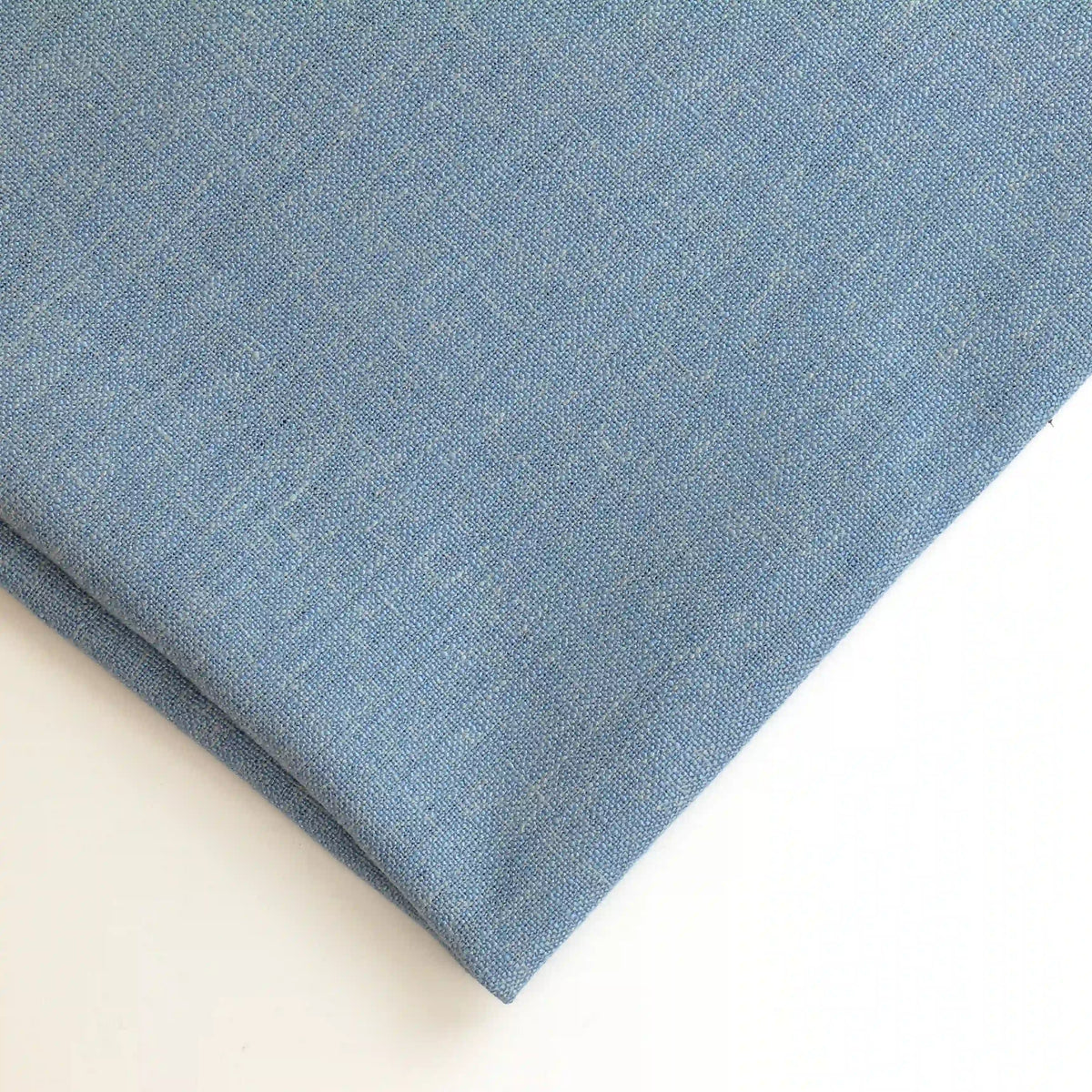 faded-denim-blue-heavyweight-linen-fabric – close-up of colour, pattern and texture