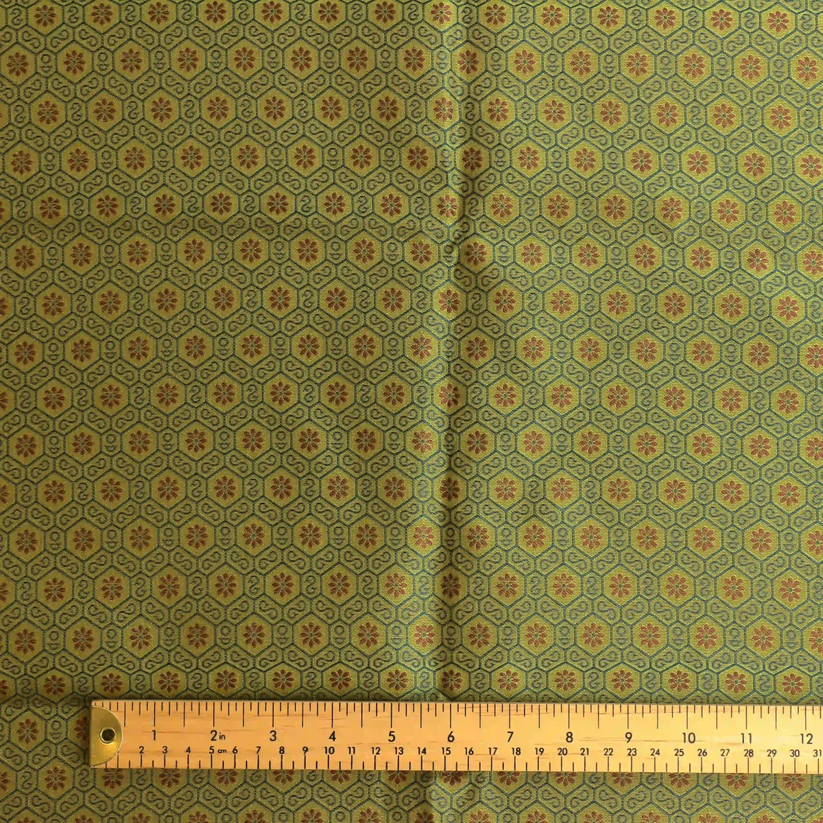 green-gold-geometric-brocade-fabric – edge, reverse or condition detail