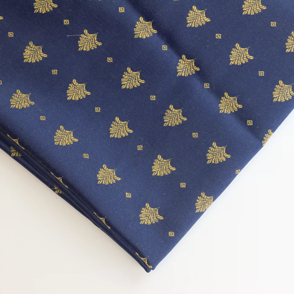 blue-&-gold-tree-print-jacquard – close-up showing weave and surface detail