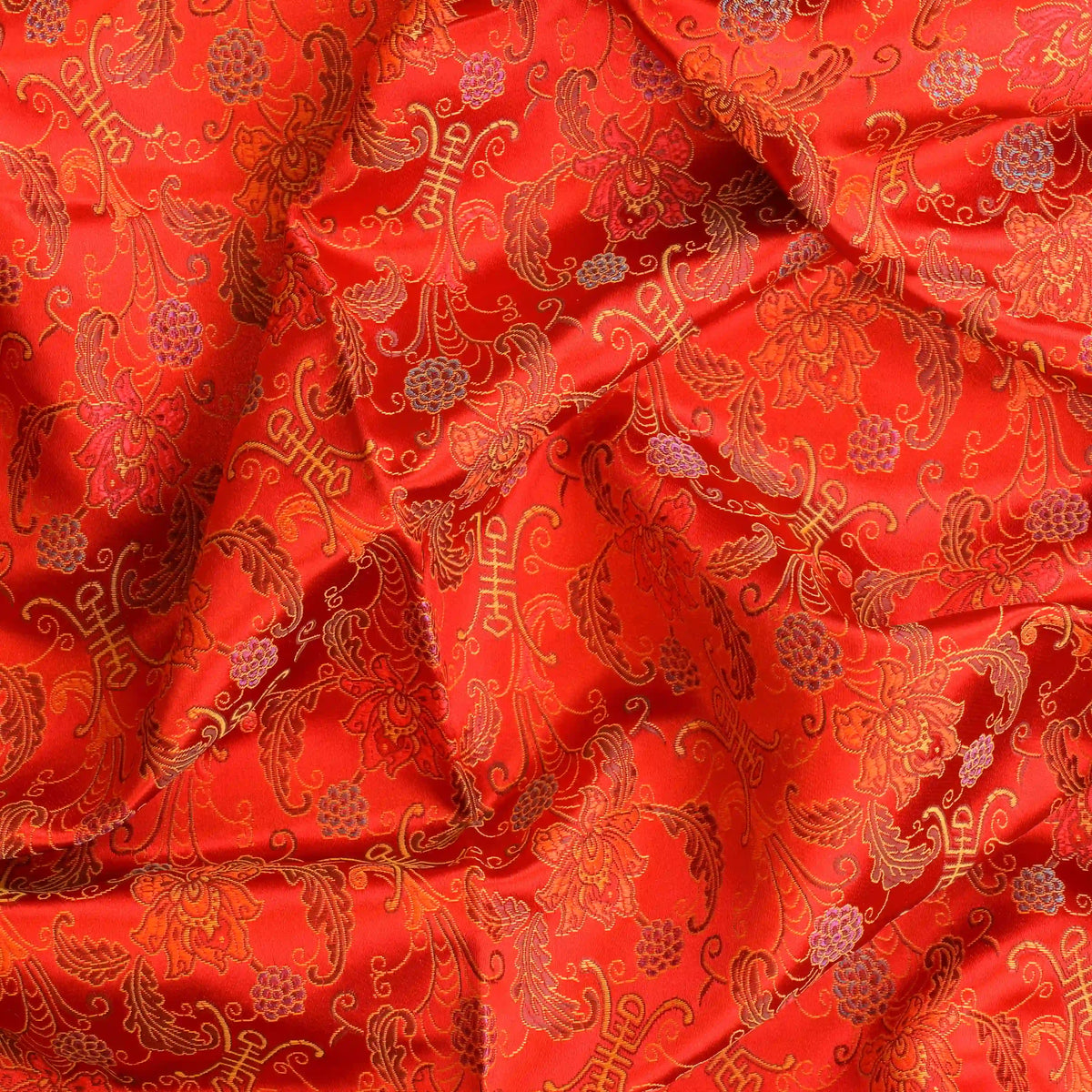 red-&-gold-floral-chinese-brocade-fabric – close-up of colour, pattern and texture