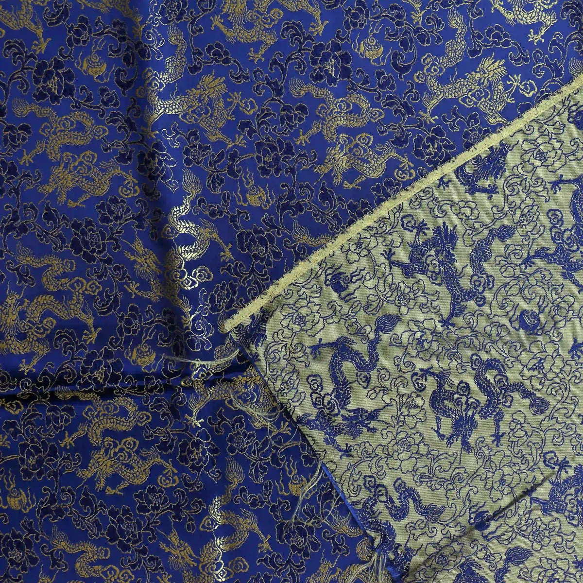 blue-&-gold-floral-dragon-jacquard-fabric – close-up showing weave and surface detail