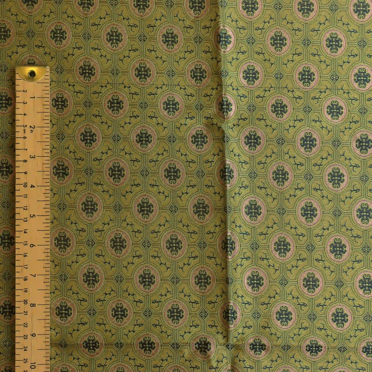 gold,-green-&-pink-geometric-brocade-fabric – edge, reverse or condition detail