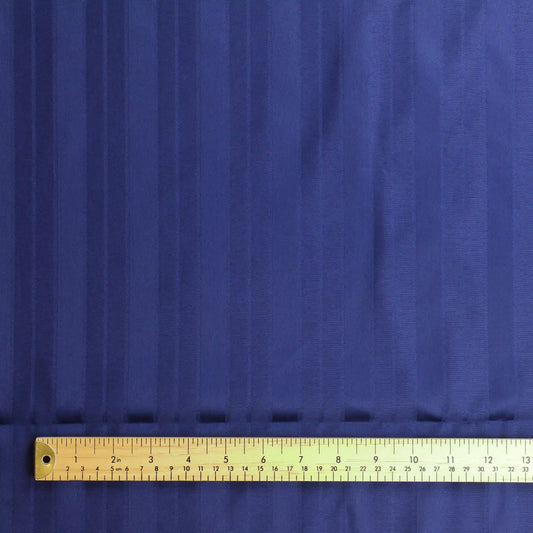 navy-blue-jacquard-striped-home-decor-fabric – product gently folded showing its colour, texture and drape