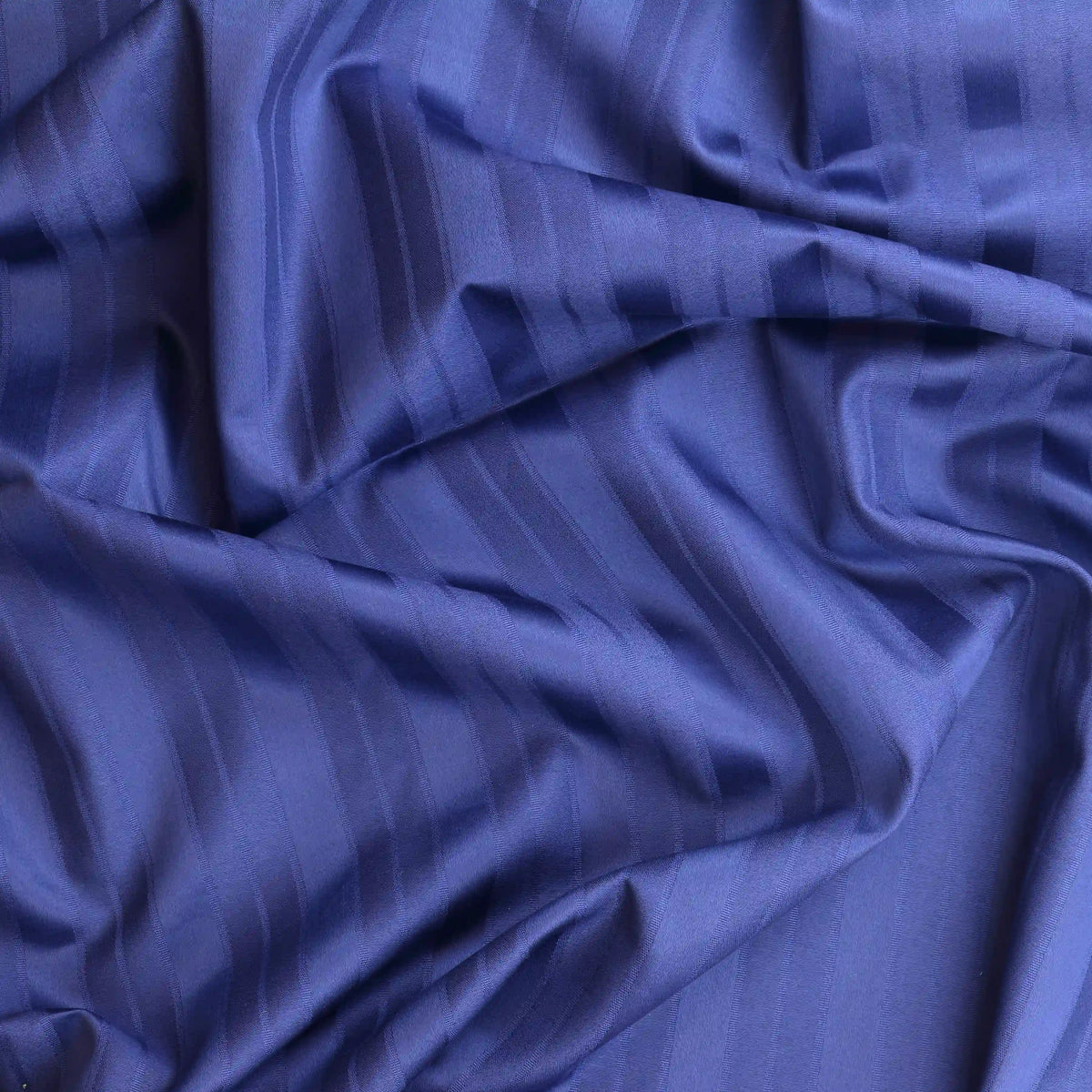navy-blue-jacquard-stripeed-home-decor-fabric-remnant-1 – close-up of colour, pattern and texture