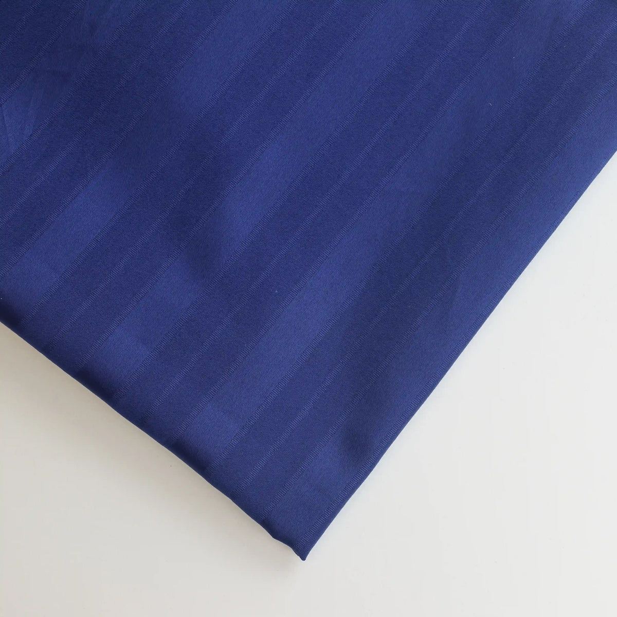navy-blue-jacquard-striped-home-decor-fabric-remnant-2 – close-up showing weave and surface detail