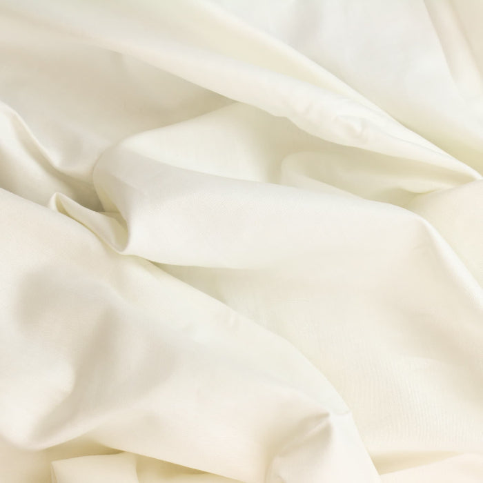 Off-white Cotton Sateen Fabric showing drape