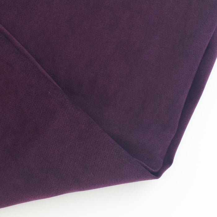 Plum Polyester Velveteen Fabric folded showing detail
