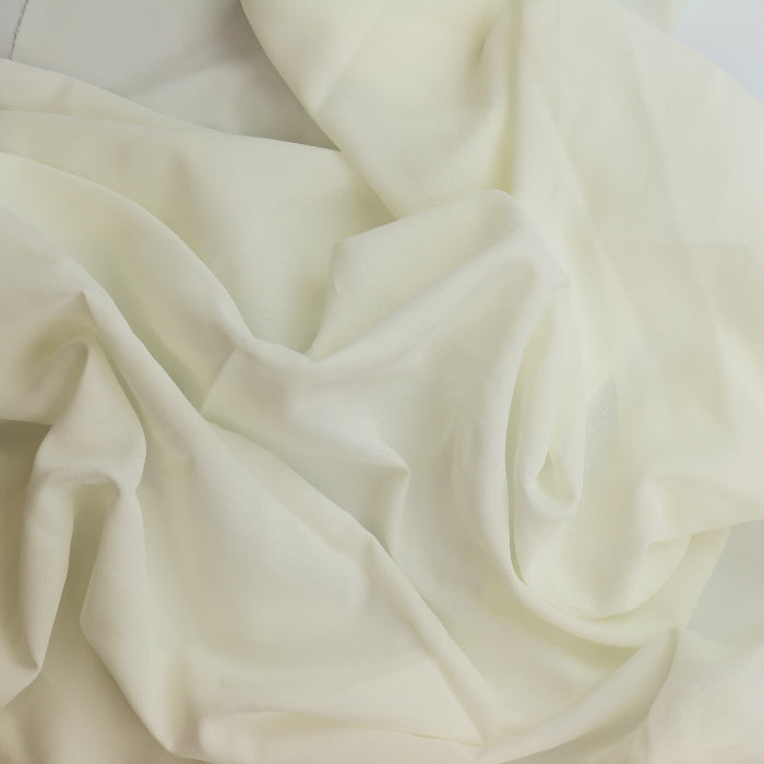 Off-white lightweight crepe fabric showing drape